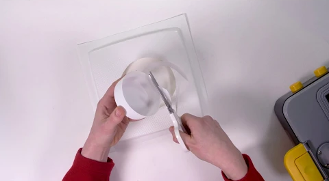 a person removing a mould from a mayku sheet