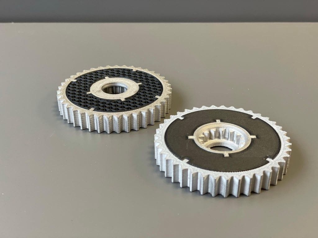 a pair of markforged 3d printed hybrid gears