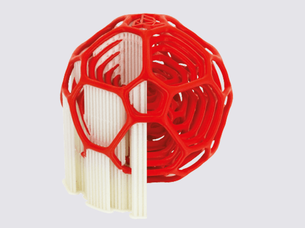 a 3dgence 3d printed sphere with support materials intact