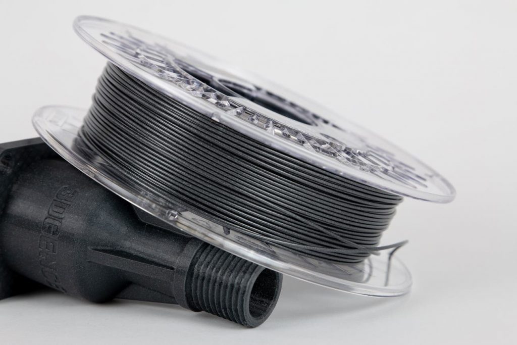 flexfill 98a filament in a spool with a sample part