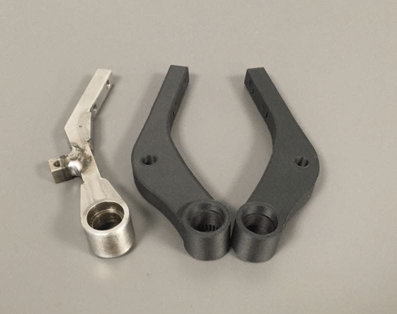 a trio of 3d printed replacement arms for a machine