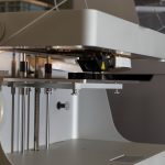 A Markforged Desktop series 3D printer 3D printing the reverse engineered part