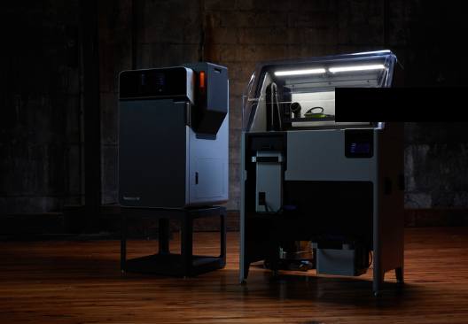 A dark room with an imposing Formlabs Fuse 1+ 30W in centre