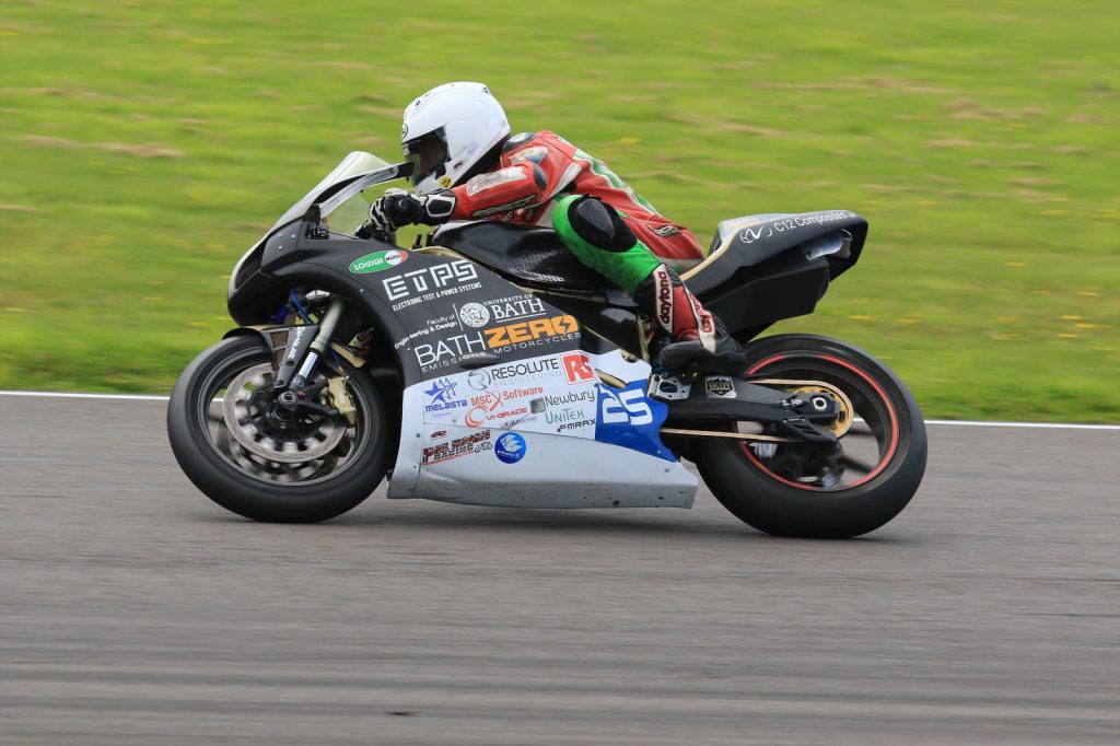 man racing a motorbike