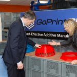 Julian Smith looking at a 3D Platform print