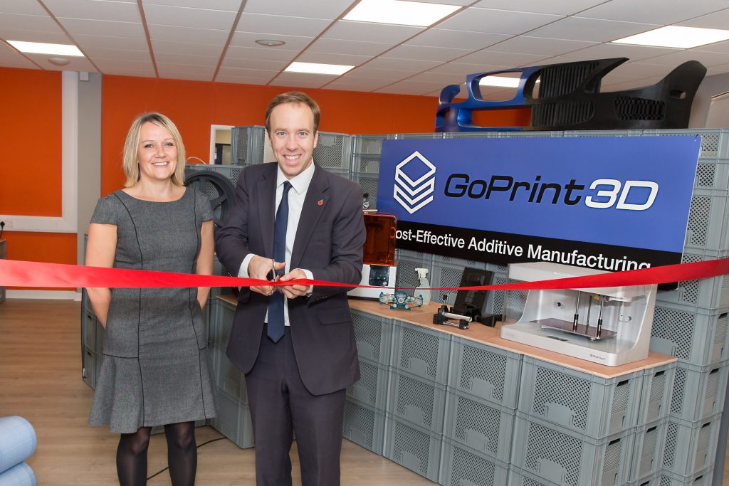matt hancock cutting a red ribbon with the additive-x managing director