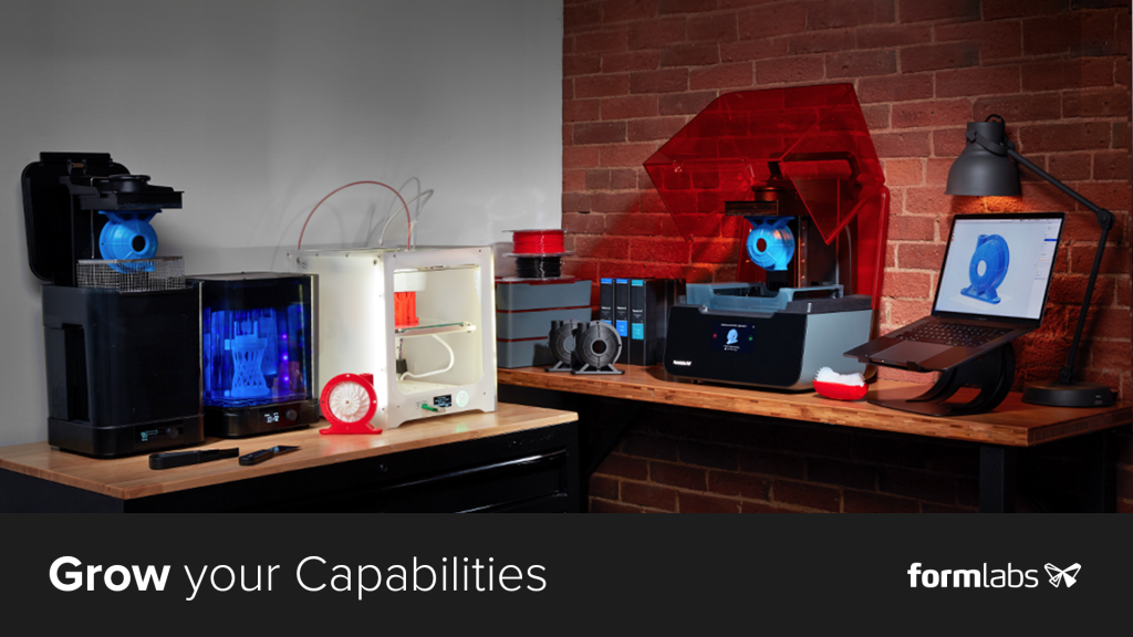 a workshop/desktop with multiple 3d printers on it, inclding formlabs 3dgence, and ultimaker printers