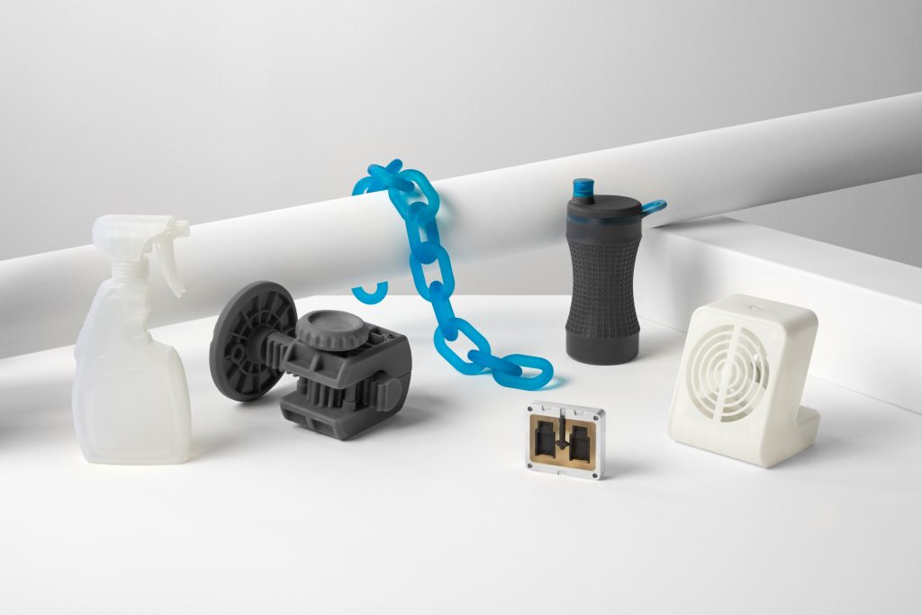 an assortment of 3d printed parts in engineering resins