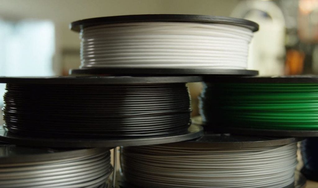 Multiple spools of different coloured essentium z-esd materials