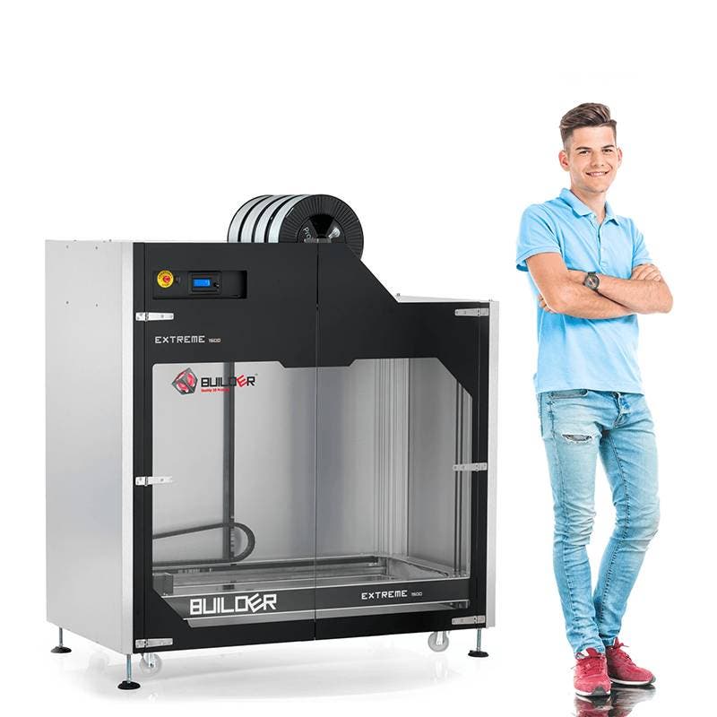 a man stood next to the Extreme 1500 PRO printer by Builder to demonstrate its build volume