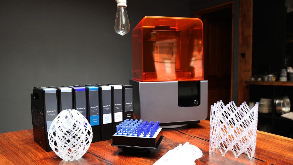 a formlabs 3d printer with a selection of resin cartridges