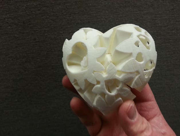 a 3d printed heart shaped set of interlocking gears for valentines day
