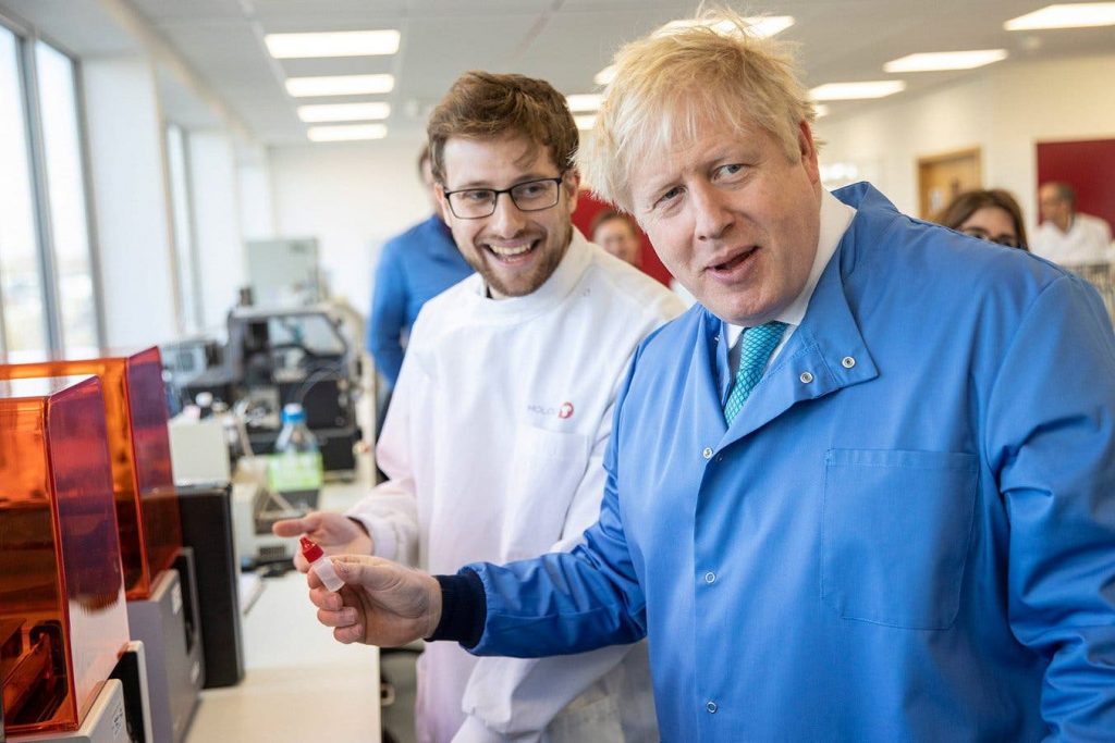 boris johnson inspecting a 3d printer