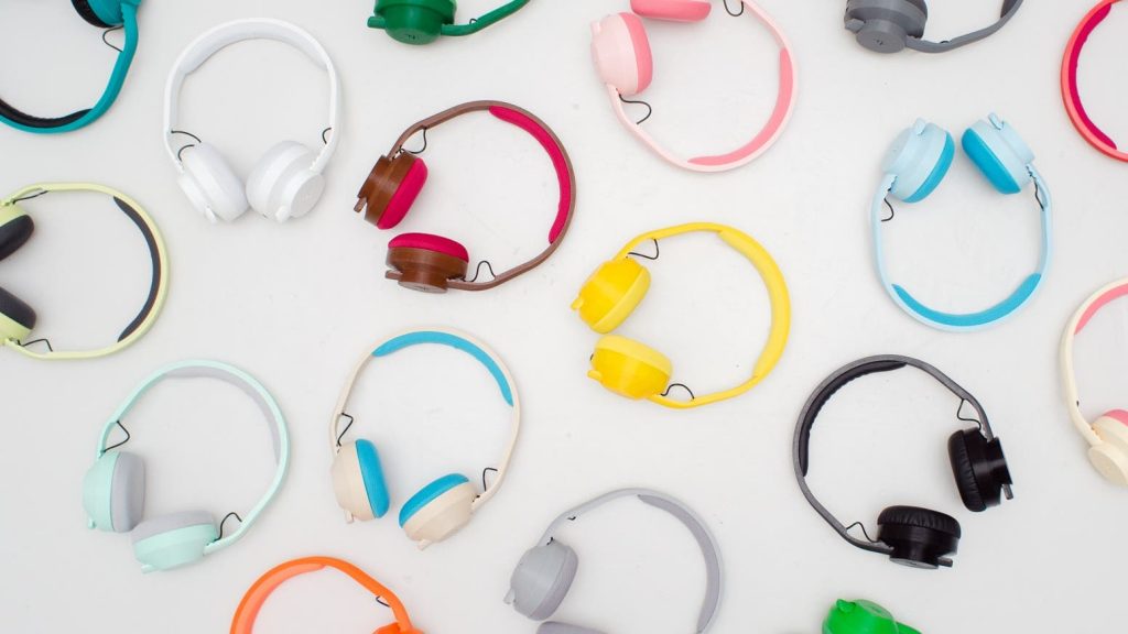 assortment of 3d printed headphones in multiple colours, including yellow, red, black