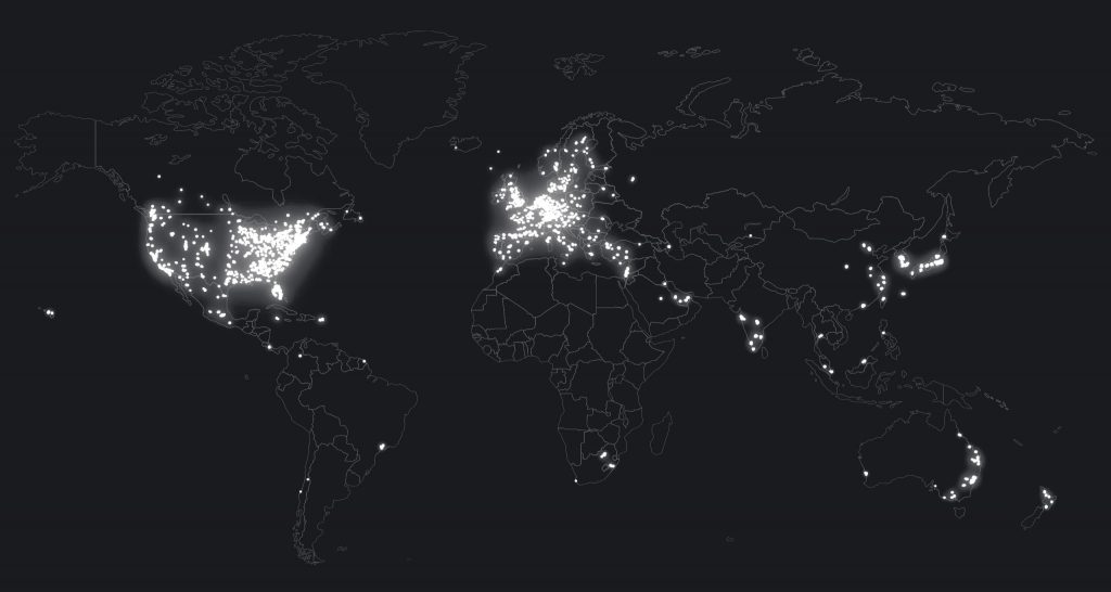 A map of the world with lights in the USA and UK and Europe signifying supply chain components