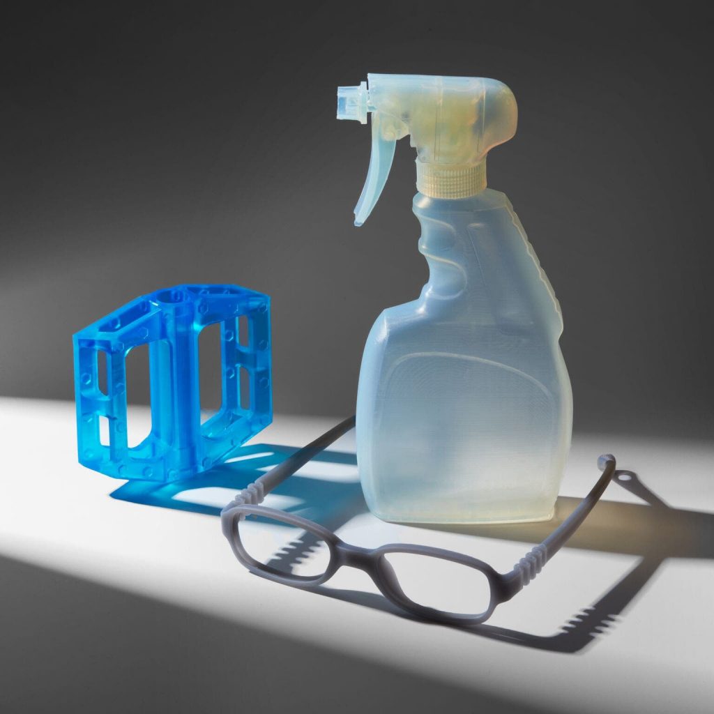3d printed glasses, bike pedal, and bottle in tough 1500 resin