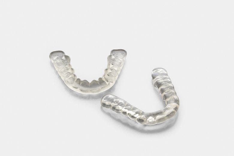 two 3d printed models of lower teeth