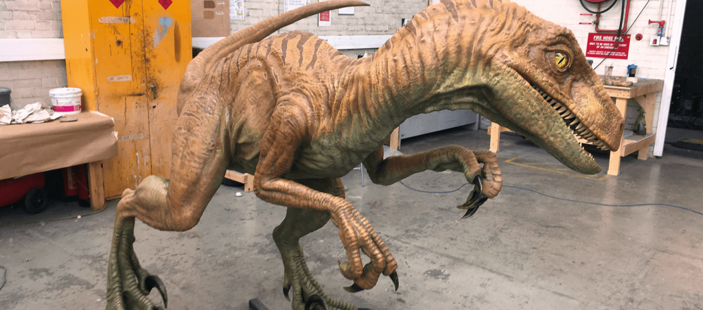a large, life-size model of a t rex dinosaur