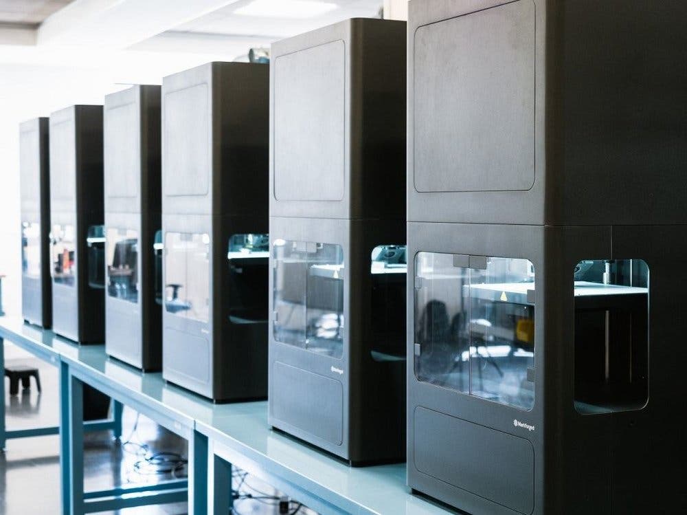 row of markforged metal x 3d printers