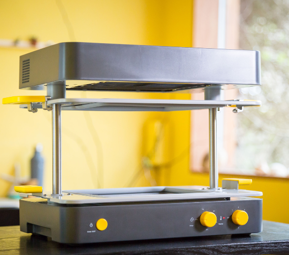 A Mayku vacuum former sat on the desktop