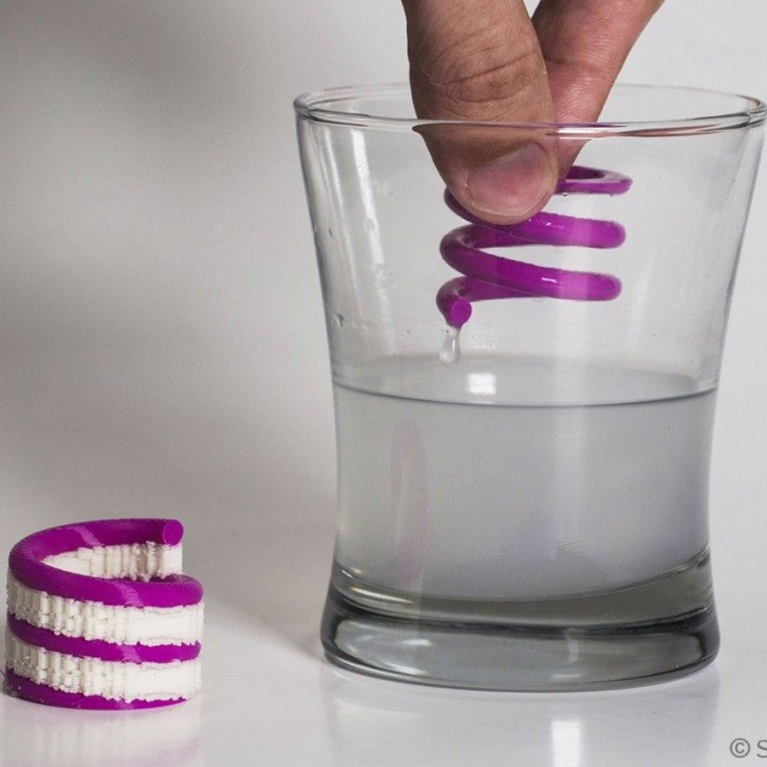 PVA material undergoing post processing by dipping in a liquid.