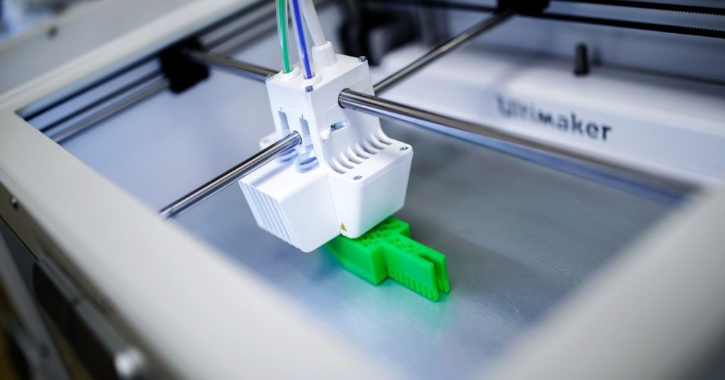 An ultimaker 3D printer producing a part