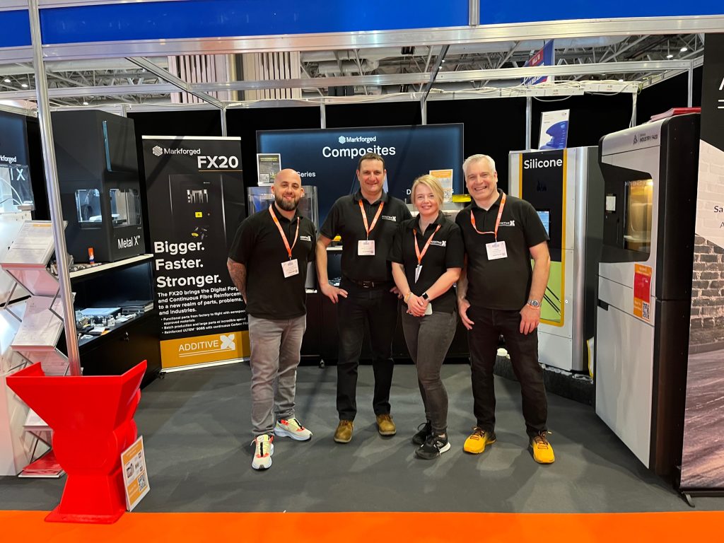 Additive-X stand at tradeshow - featuring Ultimaker, FOrmlabs, and Markforged printers.