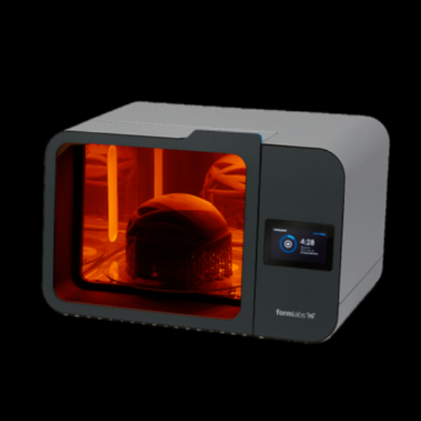 A Formlabs Cure 1 on a black background.