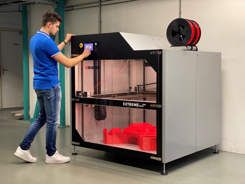 Man using a large scale Builder 3D printer