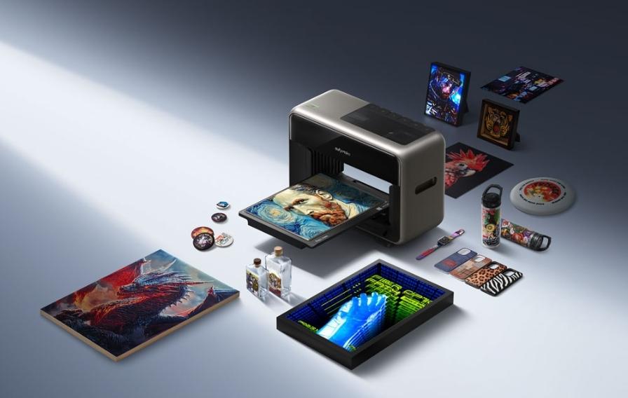 EufyMake E1 3D-texture UV printer with several full-colour raised-texture print samples displayed around it