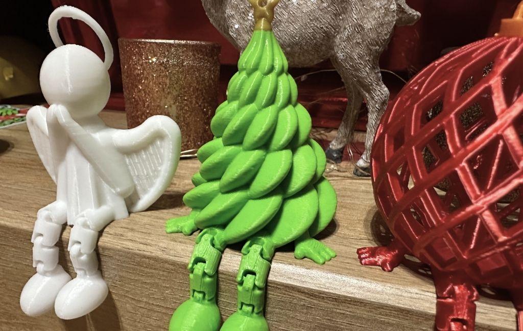 3D printed Christmas ornaments on a wooden table